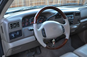 A new wood/leather steering wheel was intended as a one-time splurge at Christmas time, but instead started a snowball effect.