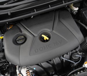 Hideous looking 1.8L engine produces  148hp / 131 lb-ft torque, identical to the sedan