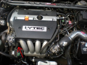 The PCV valve location on a Honda K-series 4 cylinder engine is easily accessible